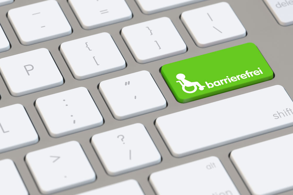 Tastatur mit grüner Taste und Rollstuhl-Symbol mit der Aufschrift „barrierefrei
